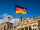 german flags at reichstag berlin germany crop
