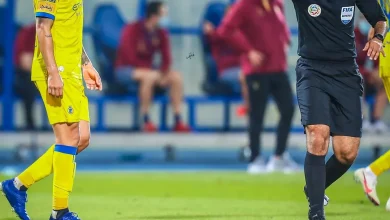 تعيين الحكم الحنفوش لمباراة النصر والاتفاق: تباين الآراء بين الجماهير حول القرار